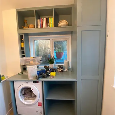 a washer and dryer in a small room